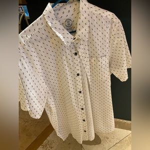 Simple black and white cotton, short sleeved men’s shirt.